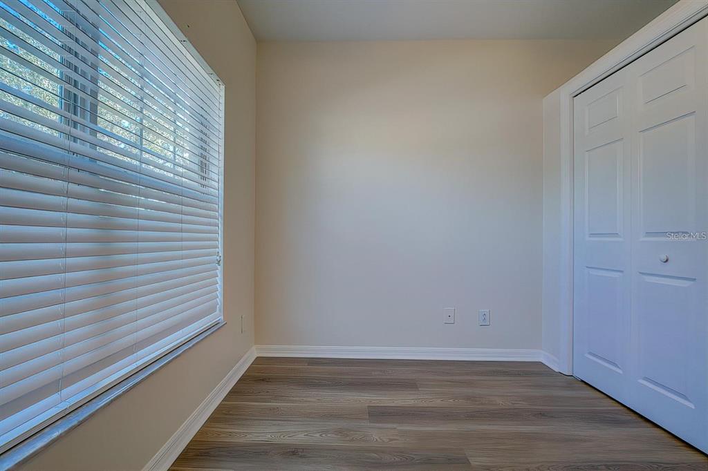 15706 Stable Run Drive Spring Hill, FL 34610 - Photo 13 of 40 a view of a small space with wooden floor