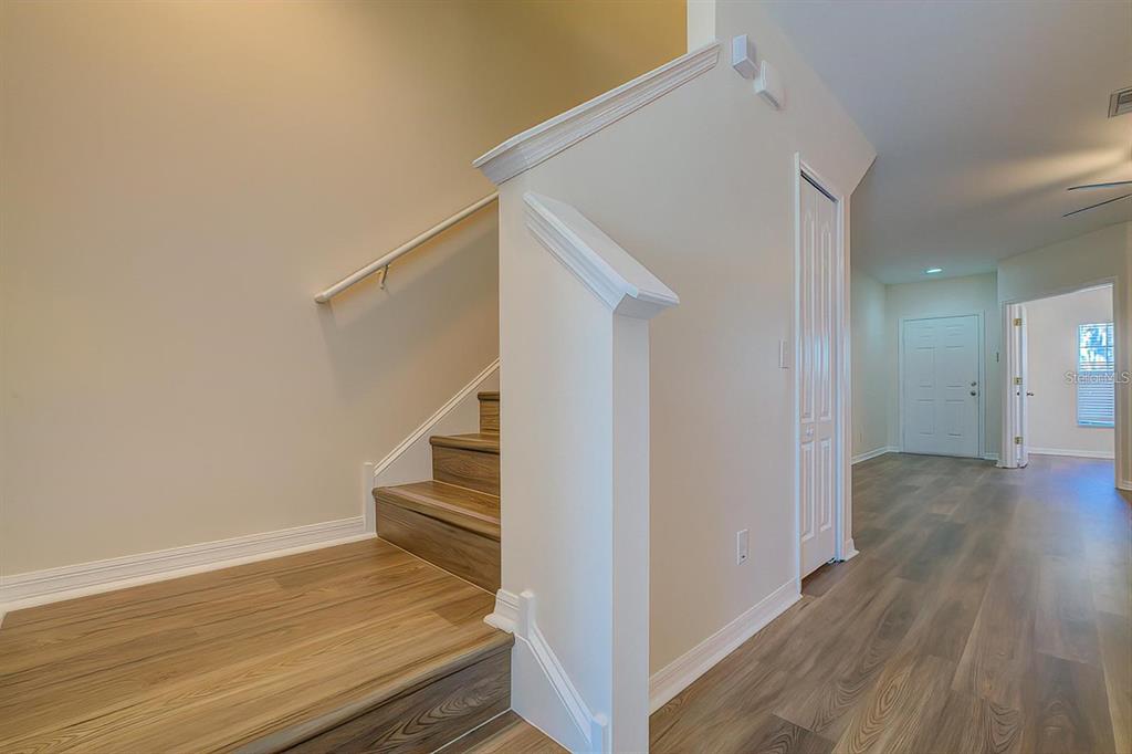 15706 Stable Run Drive Spring Hill, FL 34610 - Photo 19 of 40 a view of entryway with wooden floor