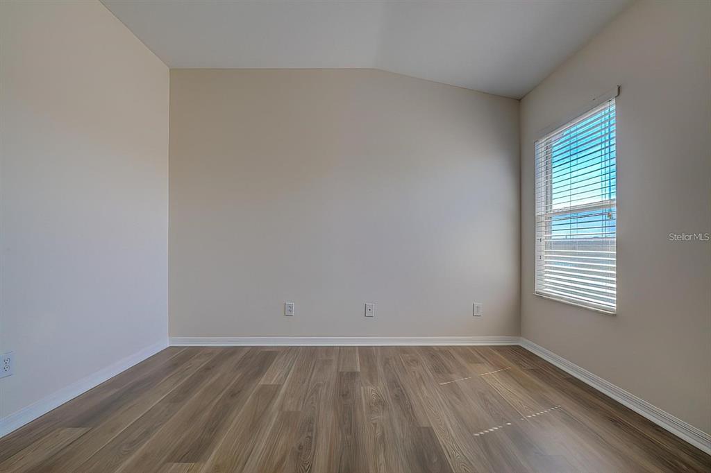 15706 Stable Run Drive Spring Hill, FL 34610 - Photo 25 of 40 an empty room with a window