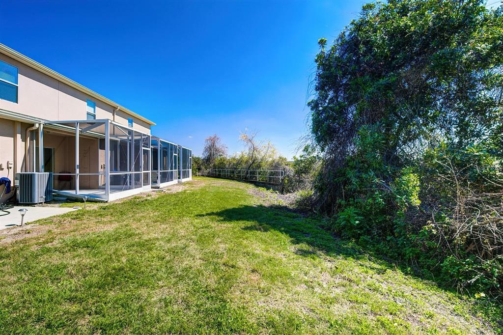 15706 Stable Run Drive Spring Hill, FL 34610 - Photo 38 of 40 a view of a house with a backyard