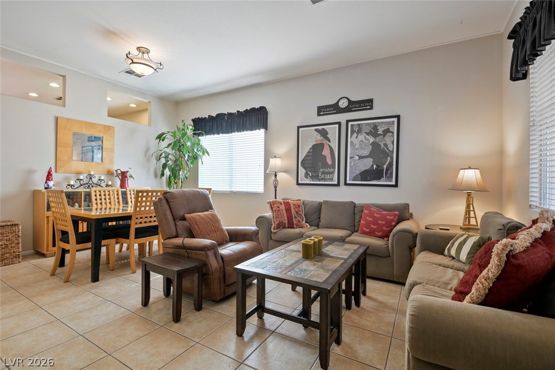 2356 Tilden Way Henderson, NV 89074 - Photo 30 of 30 Functional floorplan seamlessly connects the comfortable living area with the adjacent dining space.