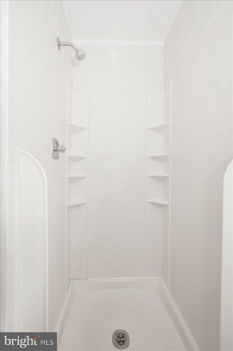 11852 Huggins Drive Silver Spring, MD 20902 - Photo 22 of 63 a bathroom with a tub