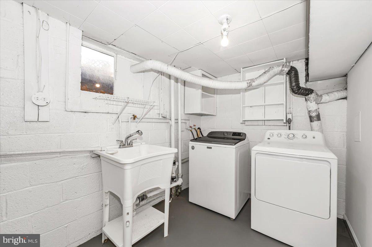 11852 Huggins Drive Silver Spring, MD 20902 - Photo 36 of 63 a utility room with dryer and washer