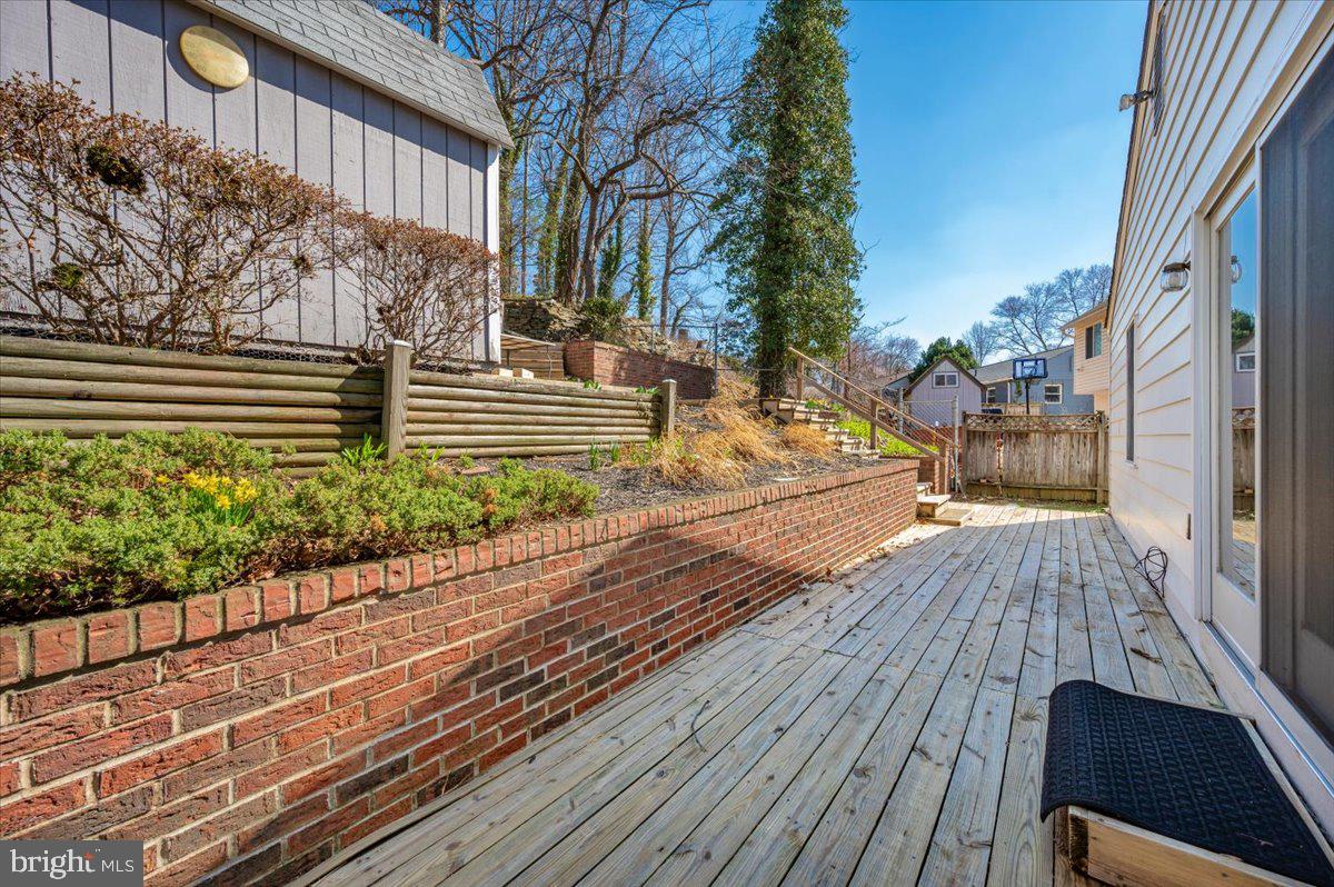11852 Huggins Drive Silver Spring, MD 20902 - Photo 42 of 63 Sunny outdoor retreat with lush greenery.