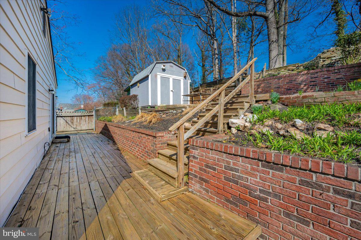 11852 Huggins Drive Silver Spring, MD 20902 - Photo 43 of 63 Charming backyard with wooden deck.