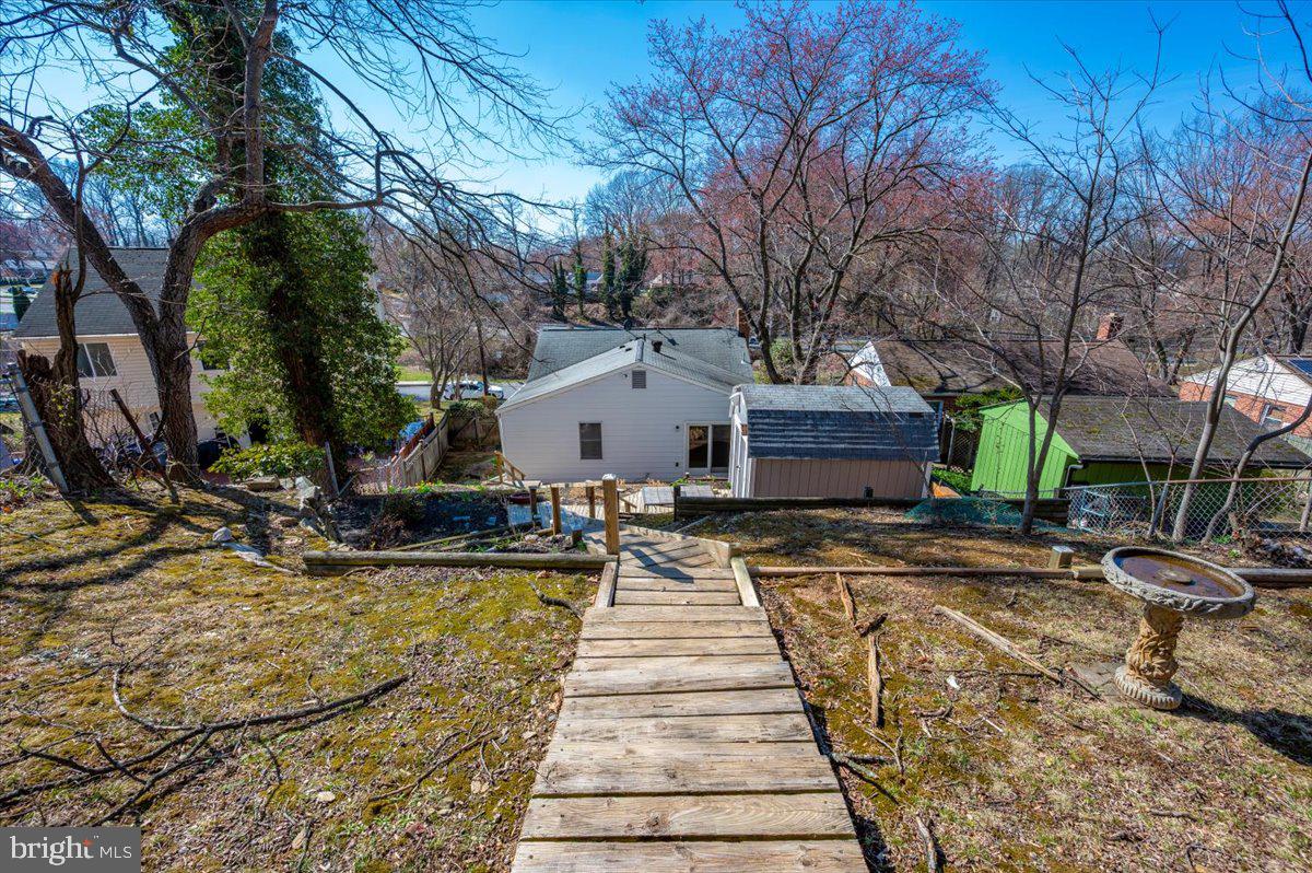 11852 Huggins Drive Silver Spring, MD 20902 - Photo 54 of 63 a view of a house with backyard and sitting area