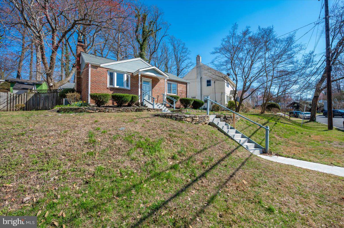 11852 Huggins Drive Silver Spring, MD 20902 - Photo 59 of 63 Charming hillside home with lush greenery.