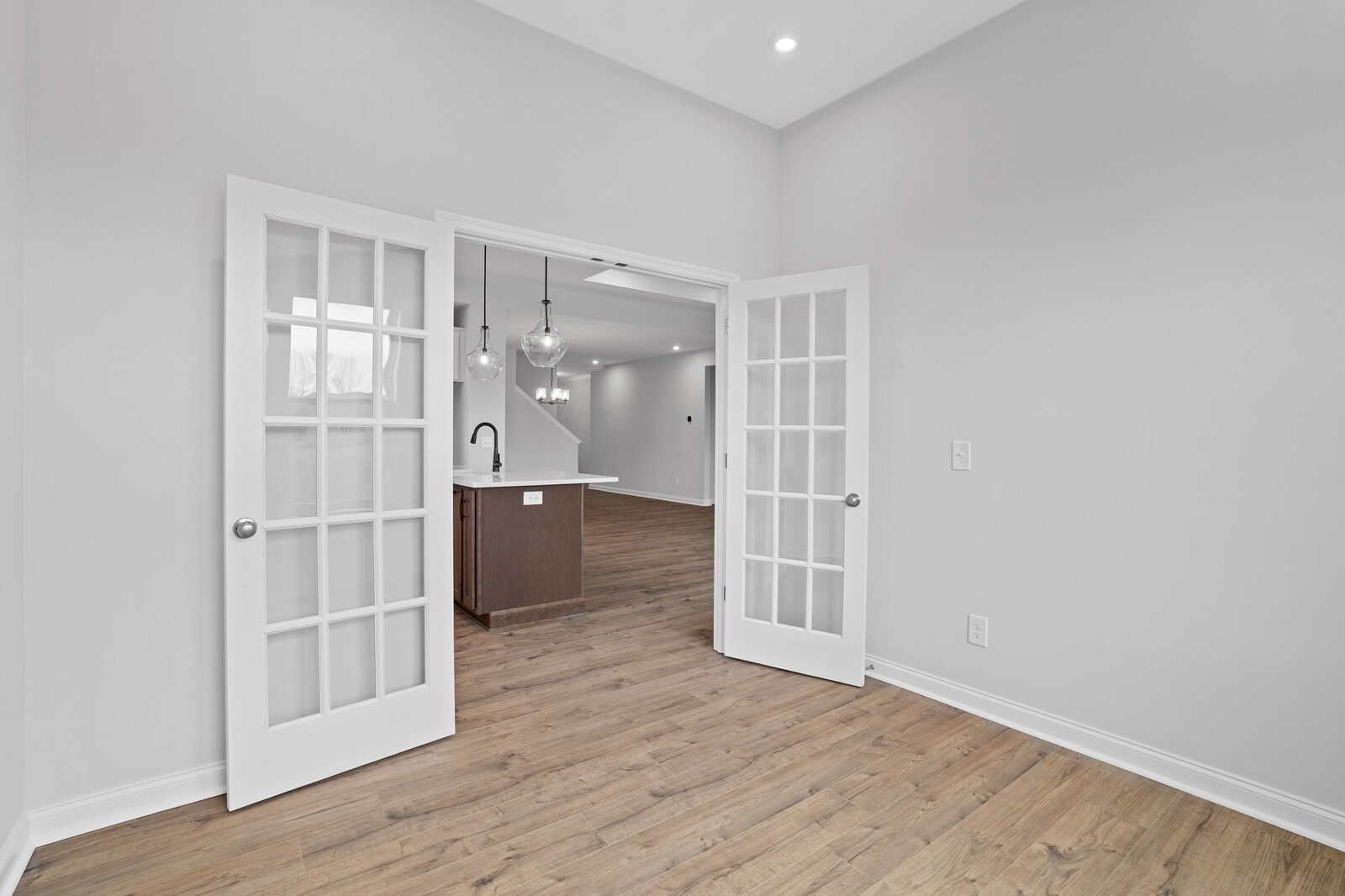 1709 Merkel Road Columbia, TN 38401 - Photo 29 of 44 an empty room with wooden floor and cabinet