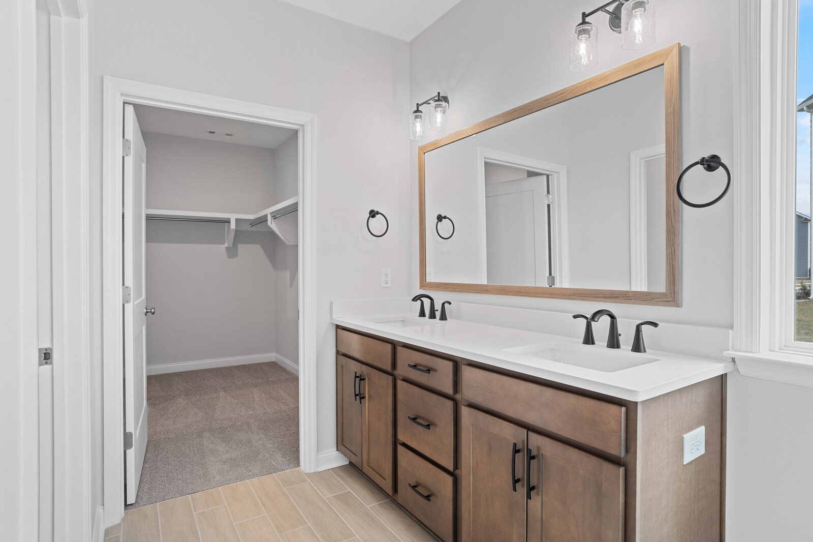 1709 Merkel Road Columbia, TN 38401 - Photo 33 of 44 a bathroom with a double vanity sink and mirror