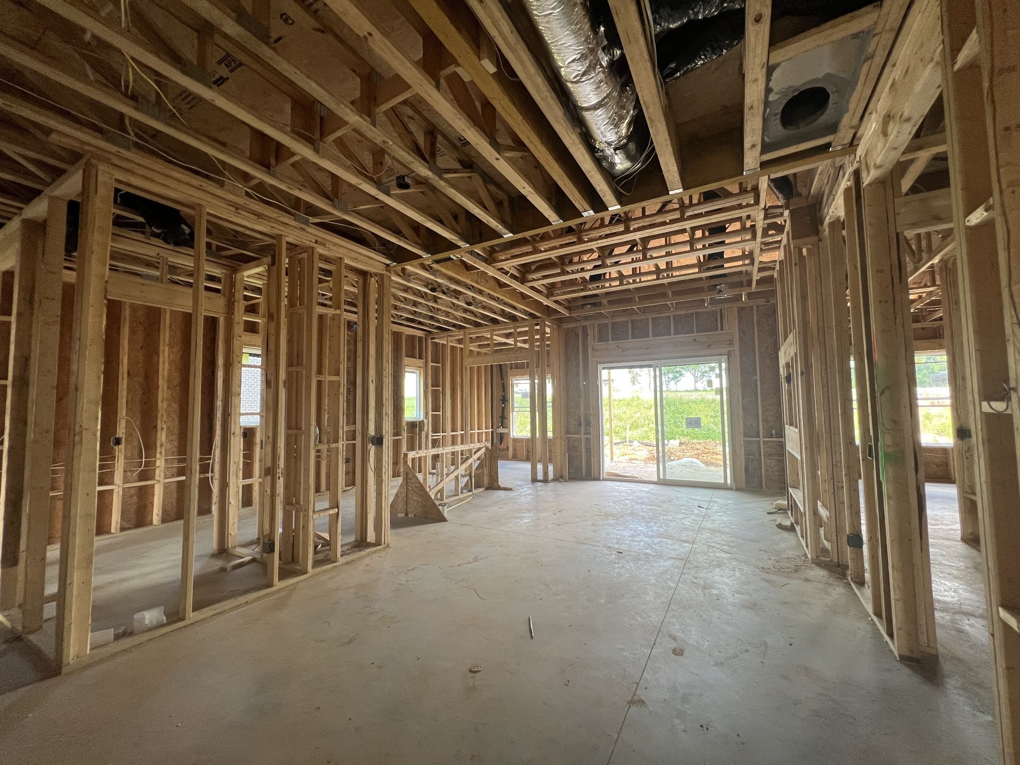 1709 Merkel Road Columbia, TN 38401 - Photo 4 of 44 a view of an empty room with wooden floor and windows