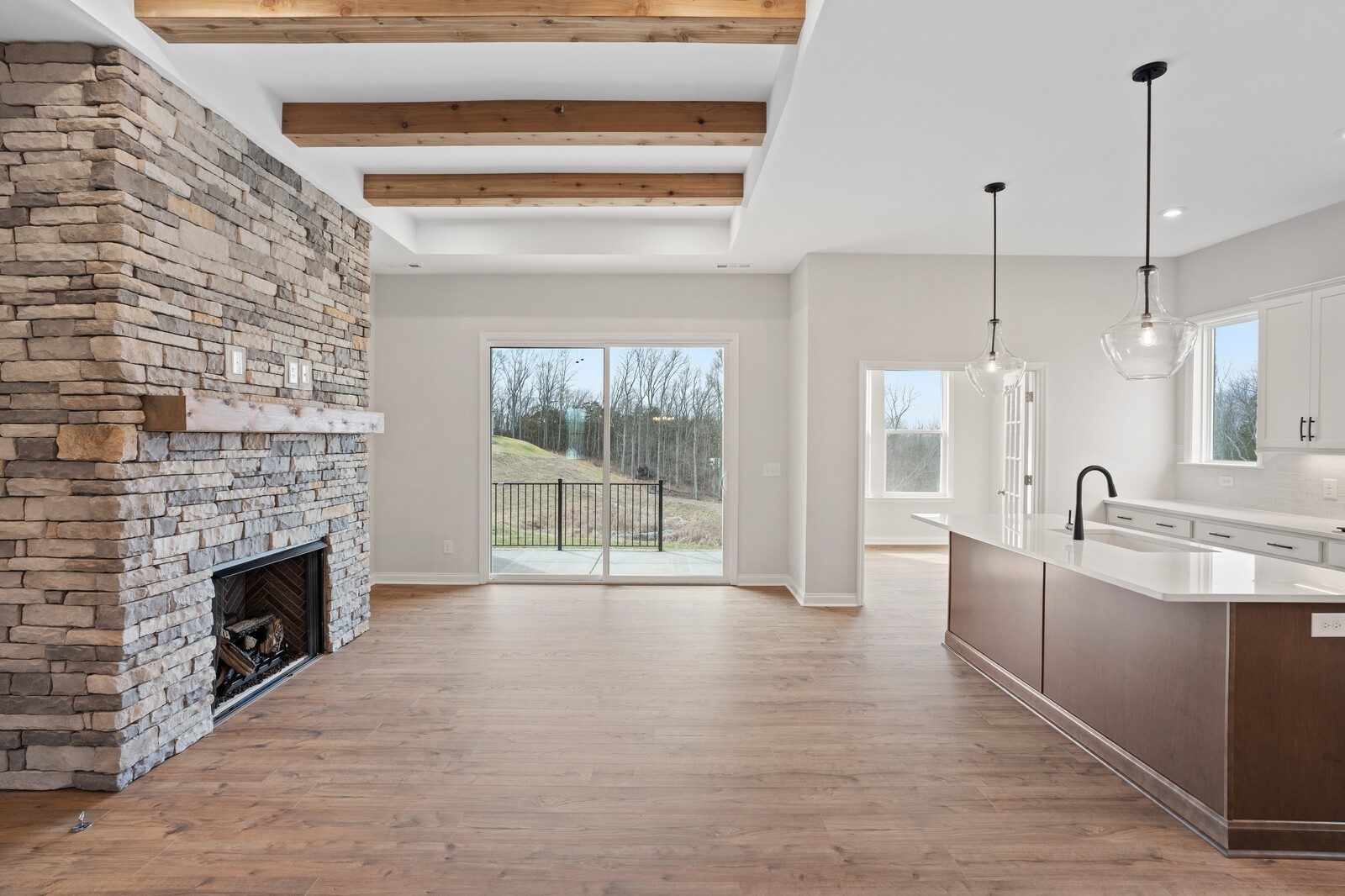 1709 Merkel Road Columbia, TN 38401 - Photo 5 of 44 a open kitchen view with fireplace a sink and a large window
