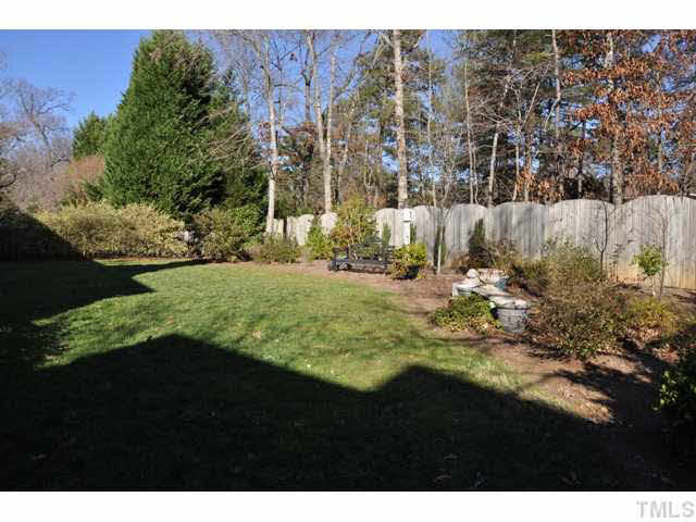 8904 Windjammer Drive Raleigh, NC 27615 - Photo 22 of 25 Wow, what a terrific back yard! Totally fenced, the grassed area could be extended into the natural areas if desired. Bring on the fun! Back Yard