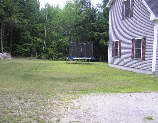 60 Hawkes Road Sebago, ME 04029 - Photo 4 of 19 Exterior Front. Large side & back yard
