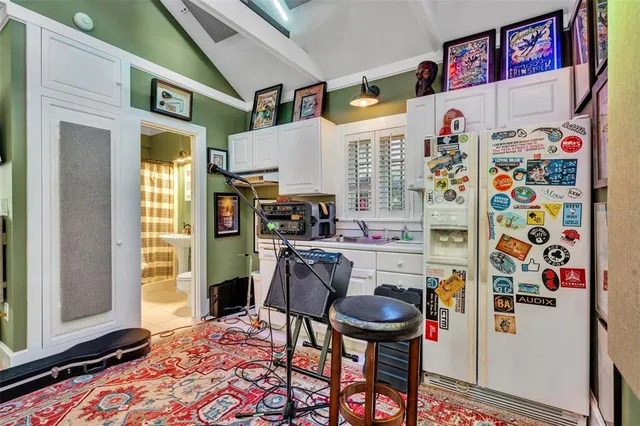 a bedroom with a bed and furniture