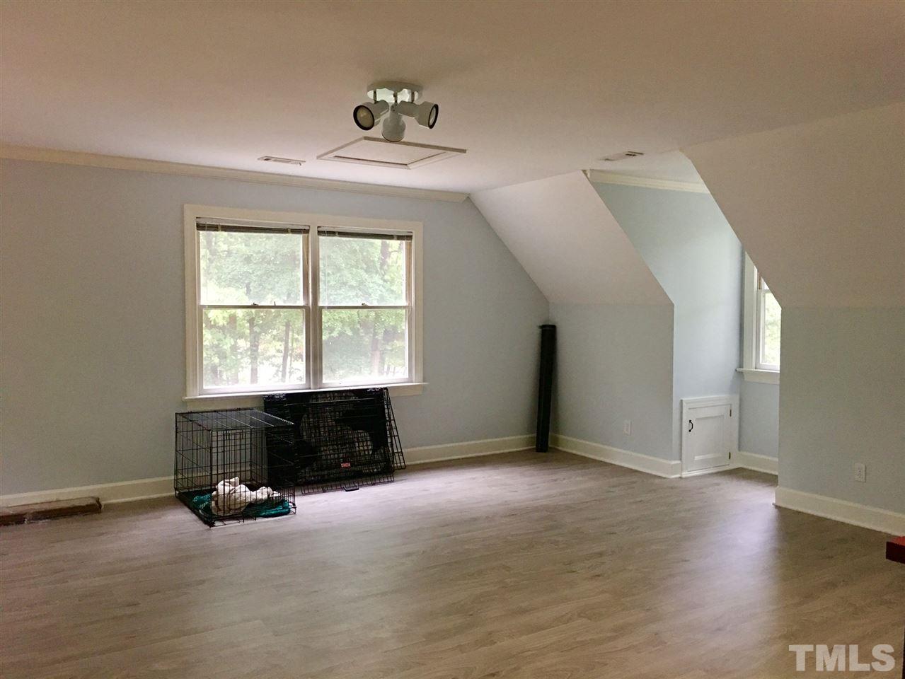 8405 Kempton Road Raleigh, NC 27615 - Photo 21 of 25 NEW flooring in bonus (April 2017). Separate staircase in bonus from garage entry door.