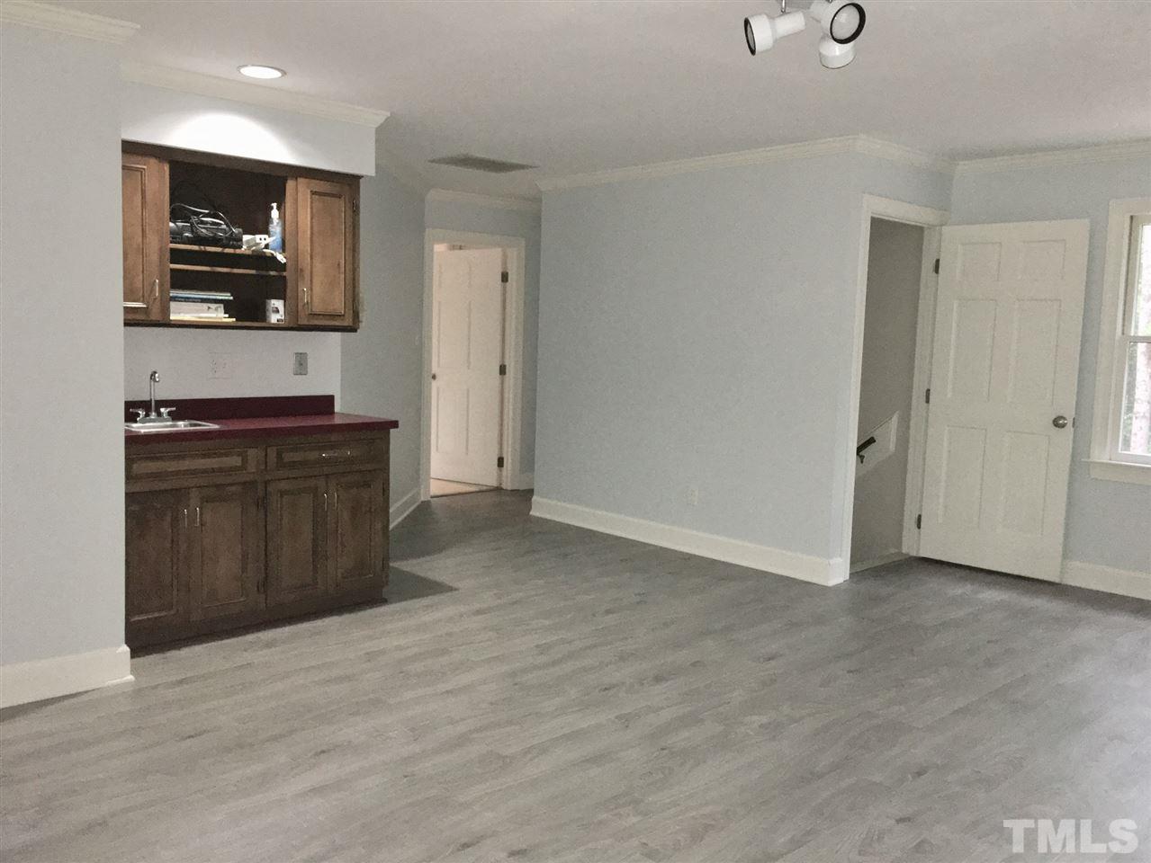8405 Kempton Road Raleigh, NC 27615 - Photo 22 of 25 NEW flooring in bonus (April 2017). Separate staircase in bonus from garage entry door.