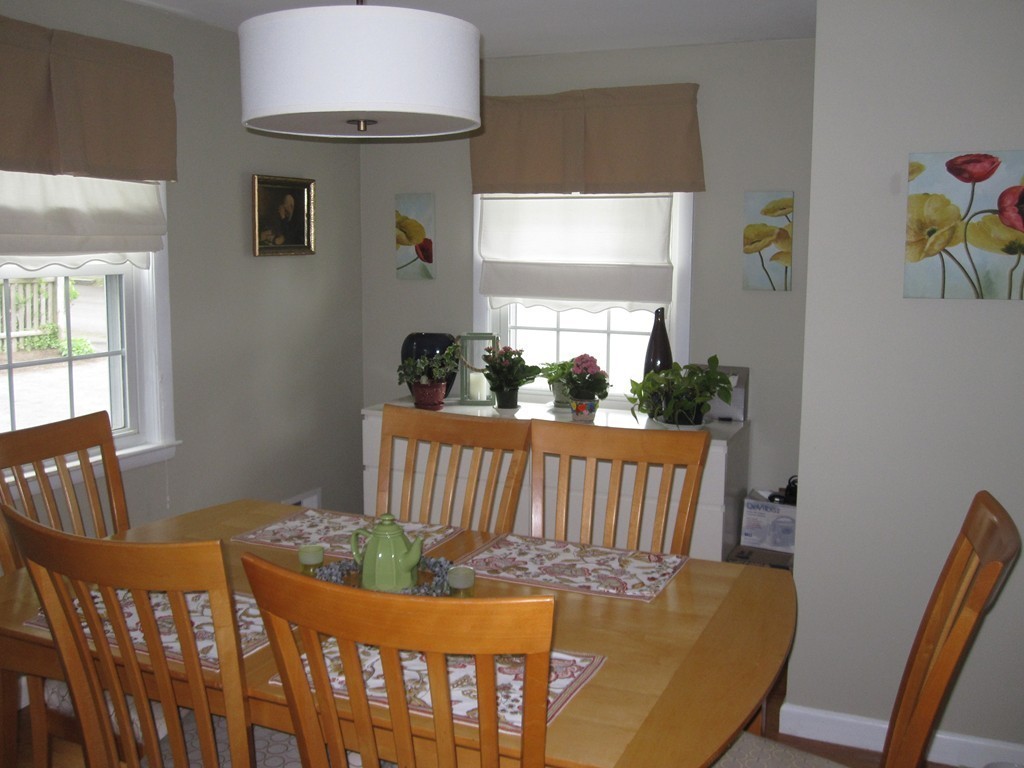 84 Bayview Road Marblehead, MA 01945 - Photo 4 of 9 a view of a dining room with furniture window and wooden floor
