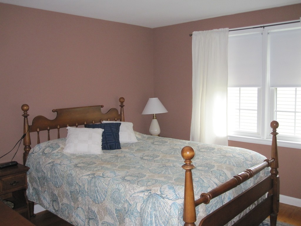 84 Bayview Road Marblehead, MA 01945 - Photo 7 of 9 a bedroom with a bed and window