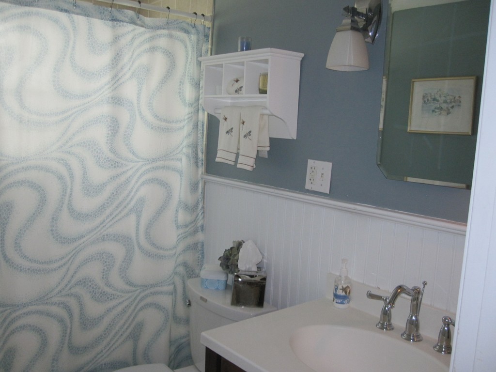 84 Bayview Road Marblehead, MA 01945 - Photo 8 of 9 a bathroom with a sink and mirror