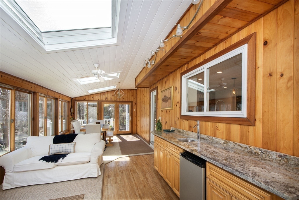 18 Longmeadow Road Scituate, MA 02066 - Photo 22 of 37 a living room with furniture and a large window