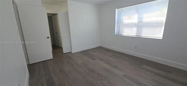 a view of a back yard of the house