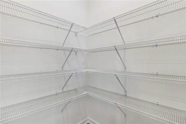 a view of a room with racks on the wall