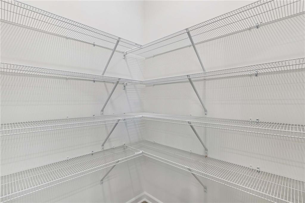 64 Silverleaf Trail Bethlehem, GA 30620 - Photo 19 of 44 a view of a room with racks on the wall