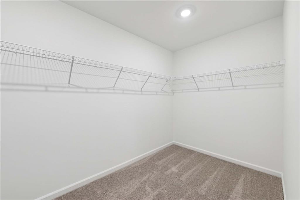 64 Silverleaf Trail Bethlehem, GA 30620 - Photo 24 of 44 a view of a room with racks on the wall