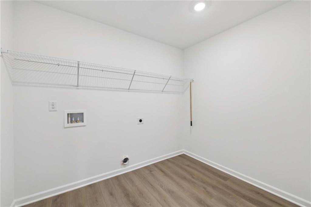 64 Silverleaf Trail Bethlehem, GA 30620 - Photo 25 of 44 a view of a room with wooden floor