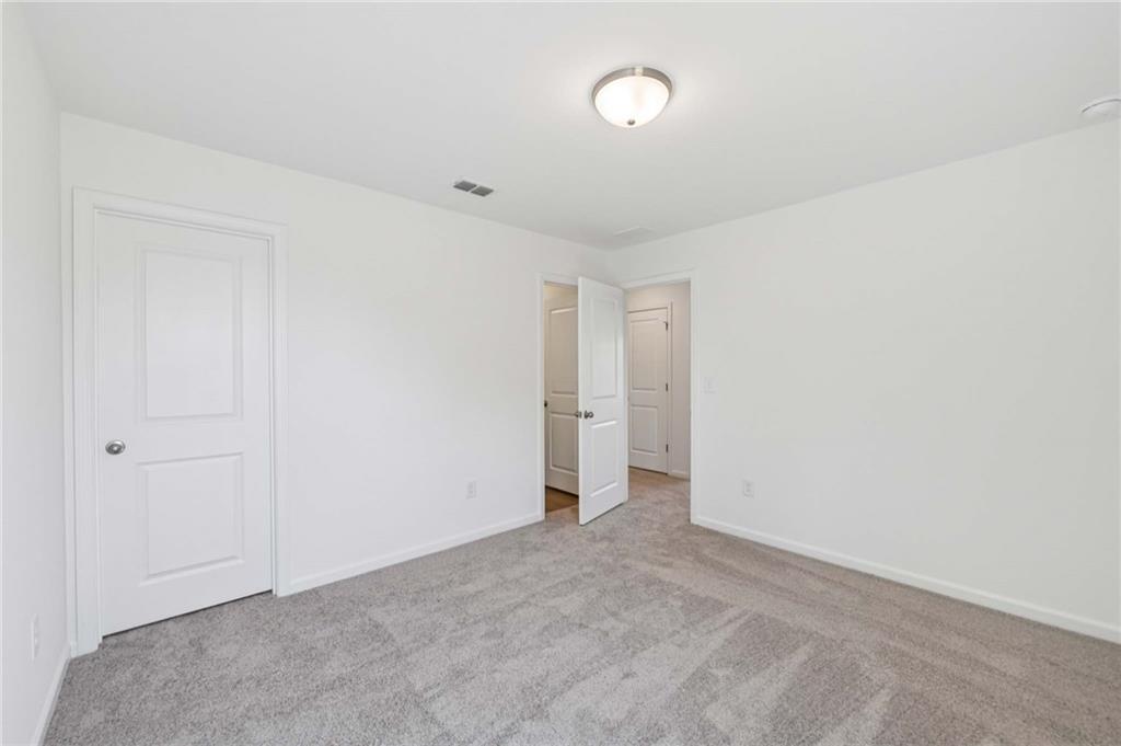 64 Silverleaf Trail Bethlehem, GA 30620 - Photo 27 of 44 a view of an empty room