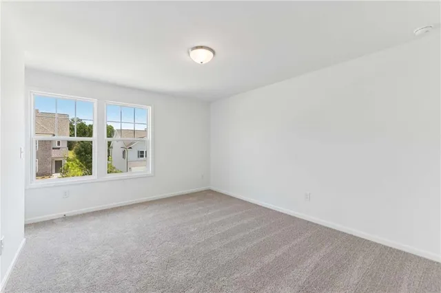 an empty room with windows