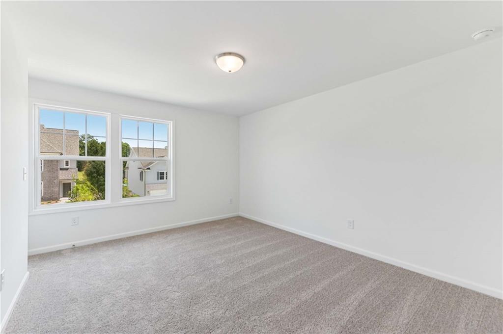 64 Silverleaf Trail Bethlehem, GA 30620 - Photo 29 of 44 an empty room with windows
