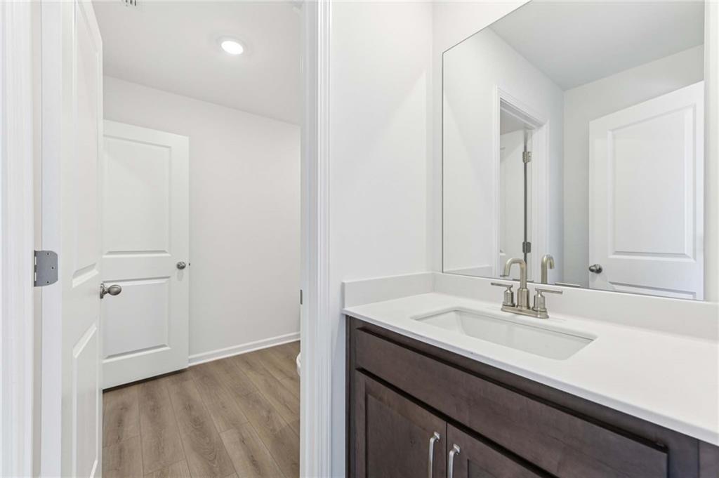 64 Silverleaf Trail Bethlehem, GA 30620 - Photo 31 of 44 a bathroom with a sink and a mirror