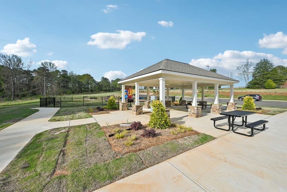 64 Silverleaf Trail Bethlehem, GA 30620 - Photo 41 of 44 a view of a house with swimming pool and sitting area