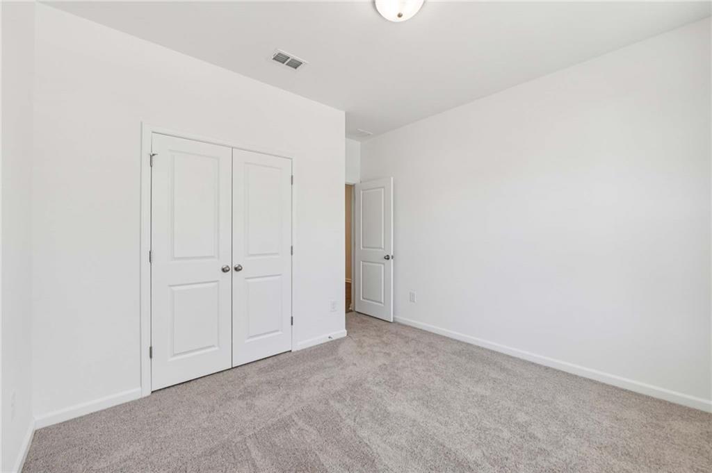 64 Silverleaf Trail Bethlehem, GA 30620 - Photo 5 of 44 a view of an empty room