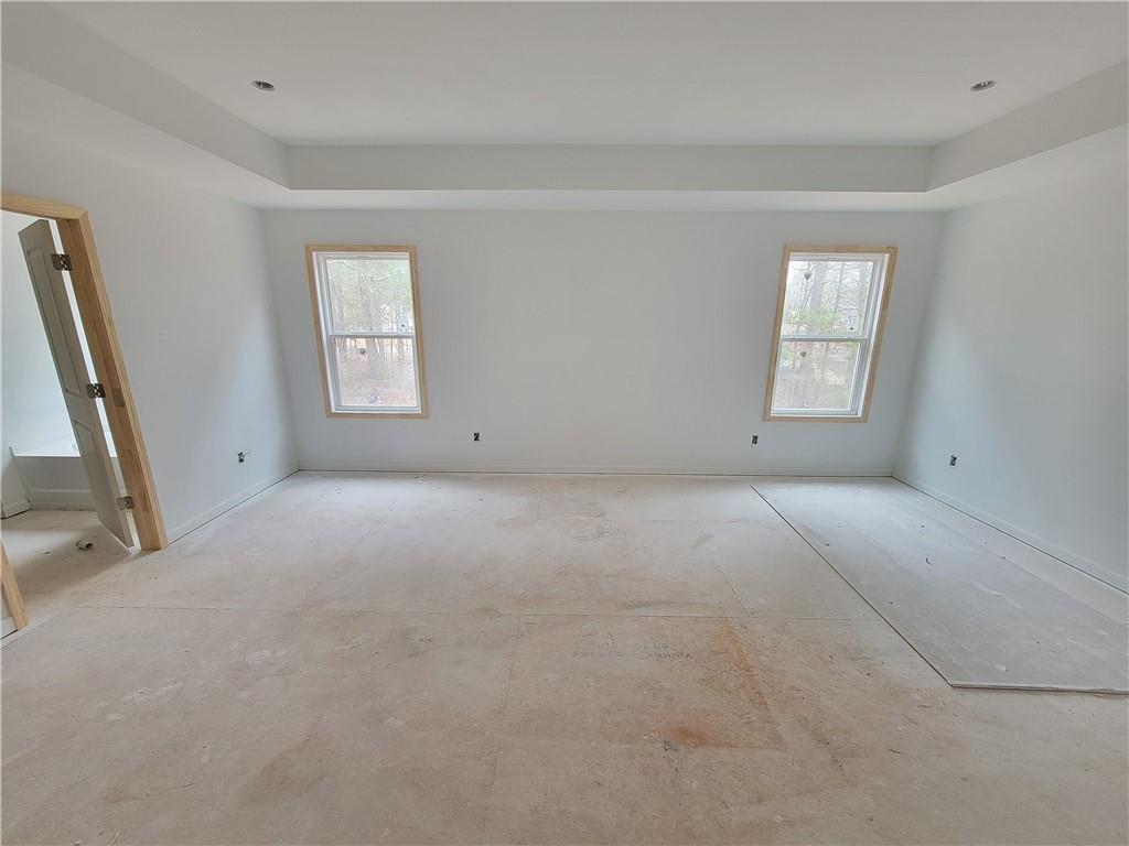 64 Silverleaf Trail Bethlehem, GA 30620 - Photo 10 of 25 a view of an empty room with a window
