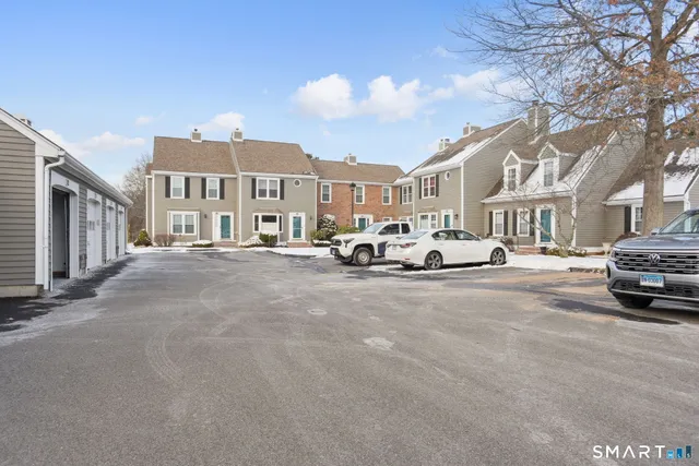 a car parked in front of houses