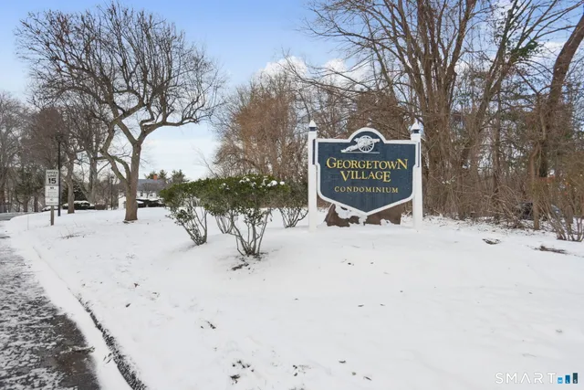 a sign that is on the side of a road