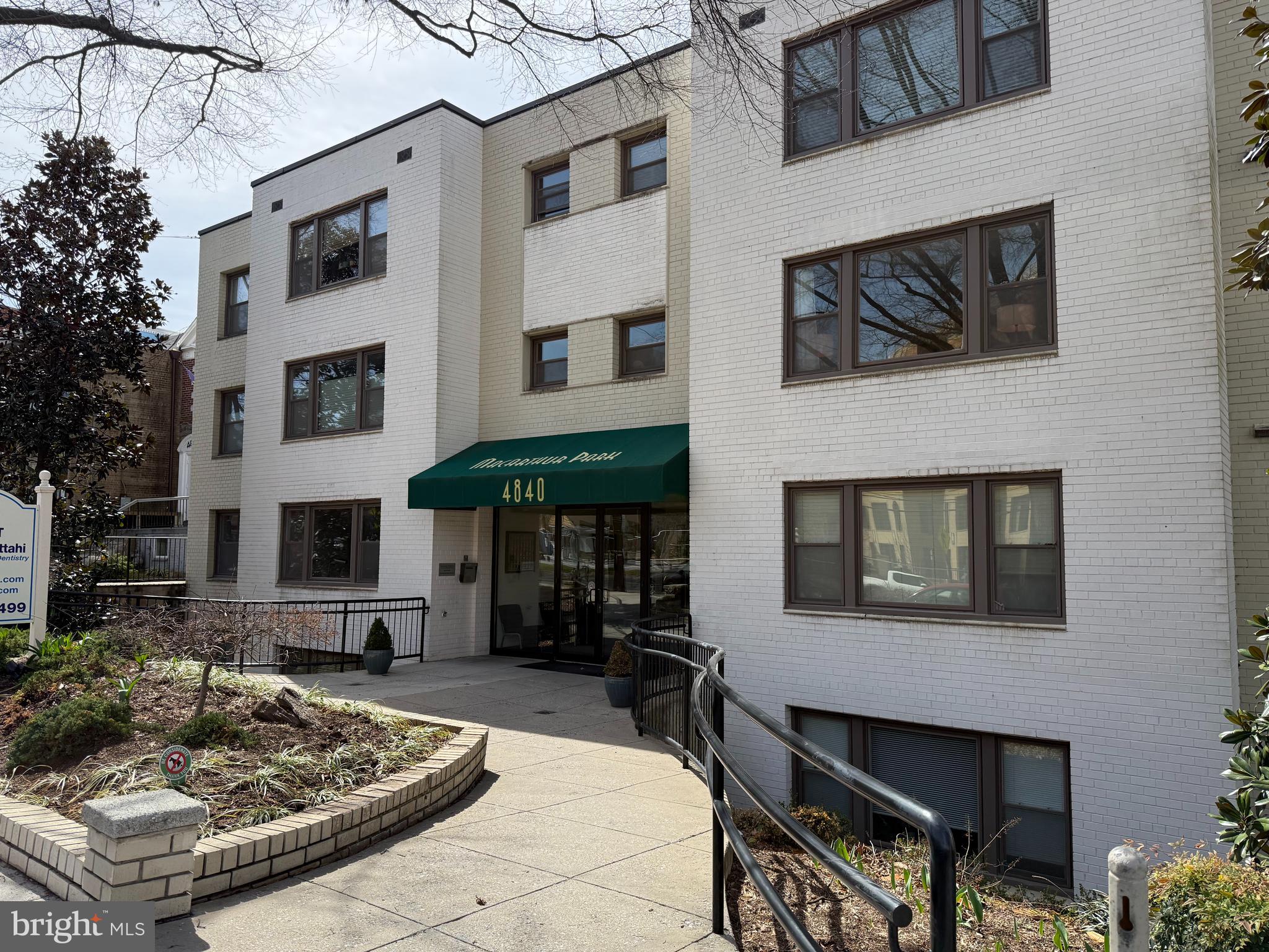 4840 MacArthur Boulevard Northwest, Unit 504 Washington, DC 20007 - Photo 1 of 10 a front view of a house with entertaining space