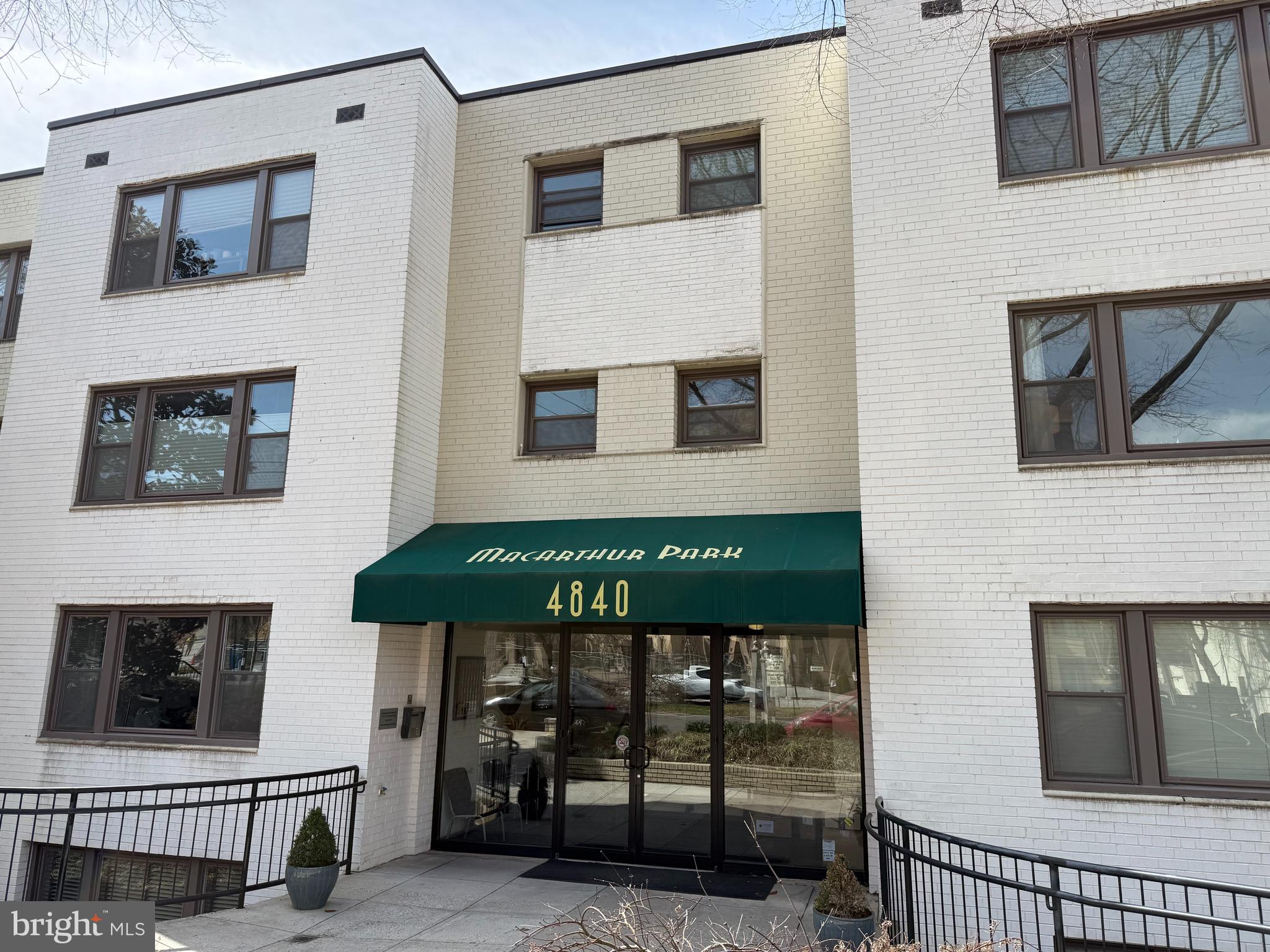 4840 MacArthur Boulevard Northwest, Unit 504 Washington, DC 20007 - Photo 3 of 10 a front view of a house with balcony