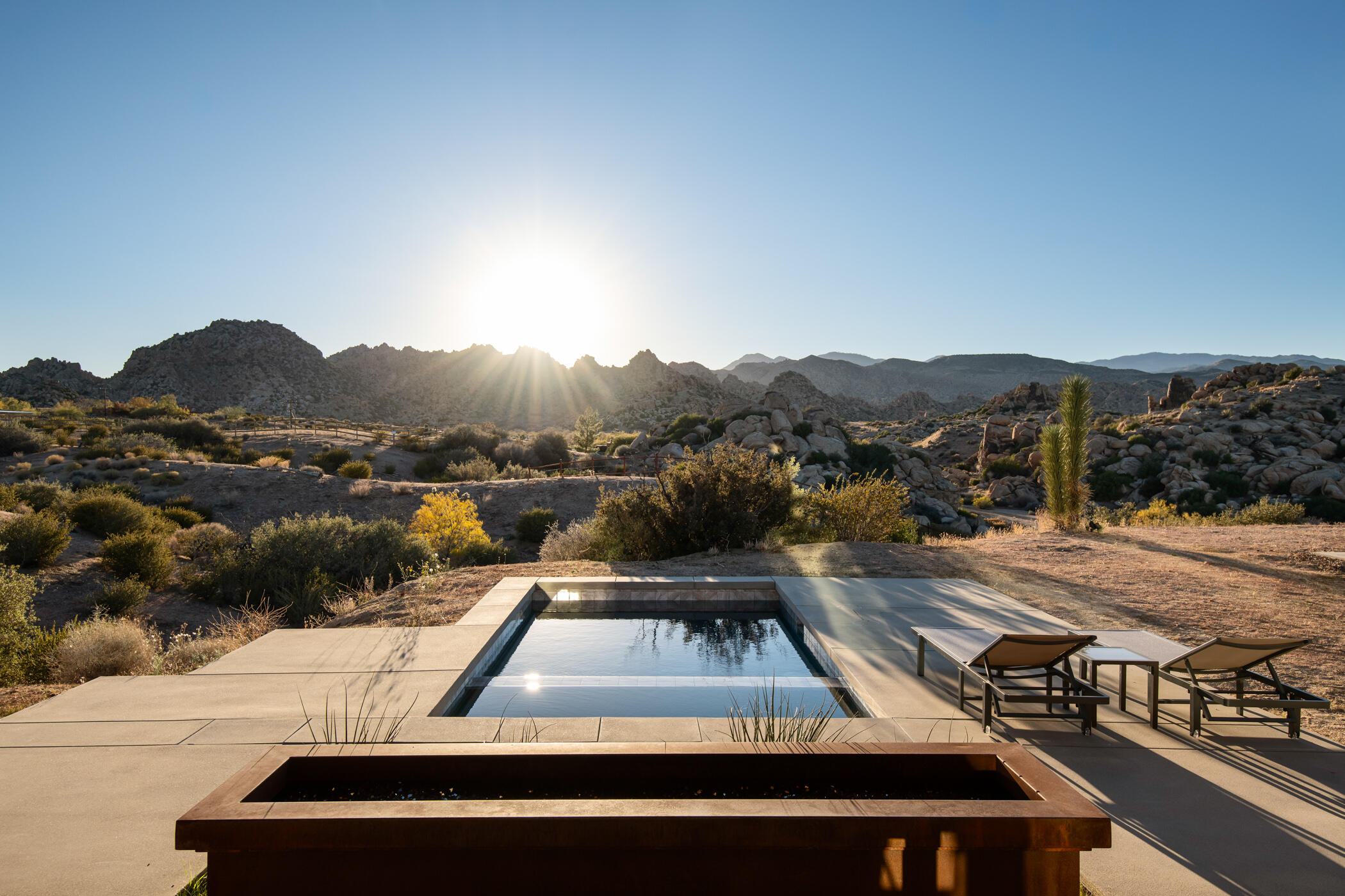 a view of a swimming pool with a mountain