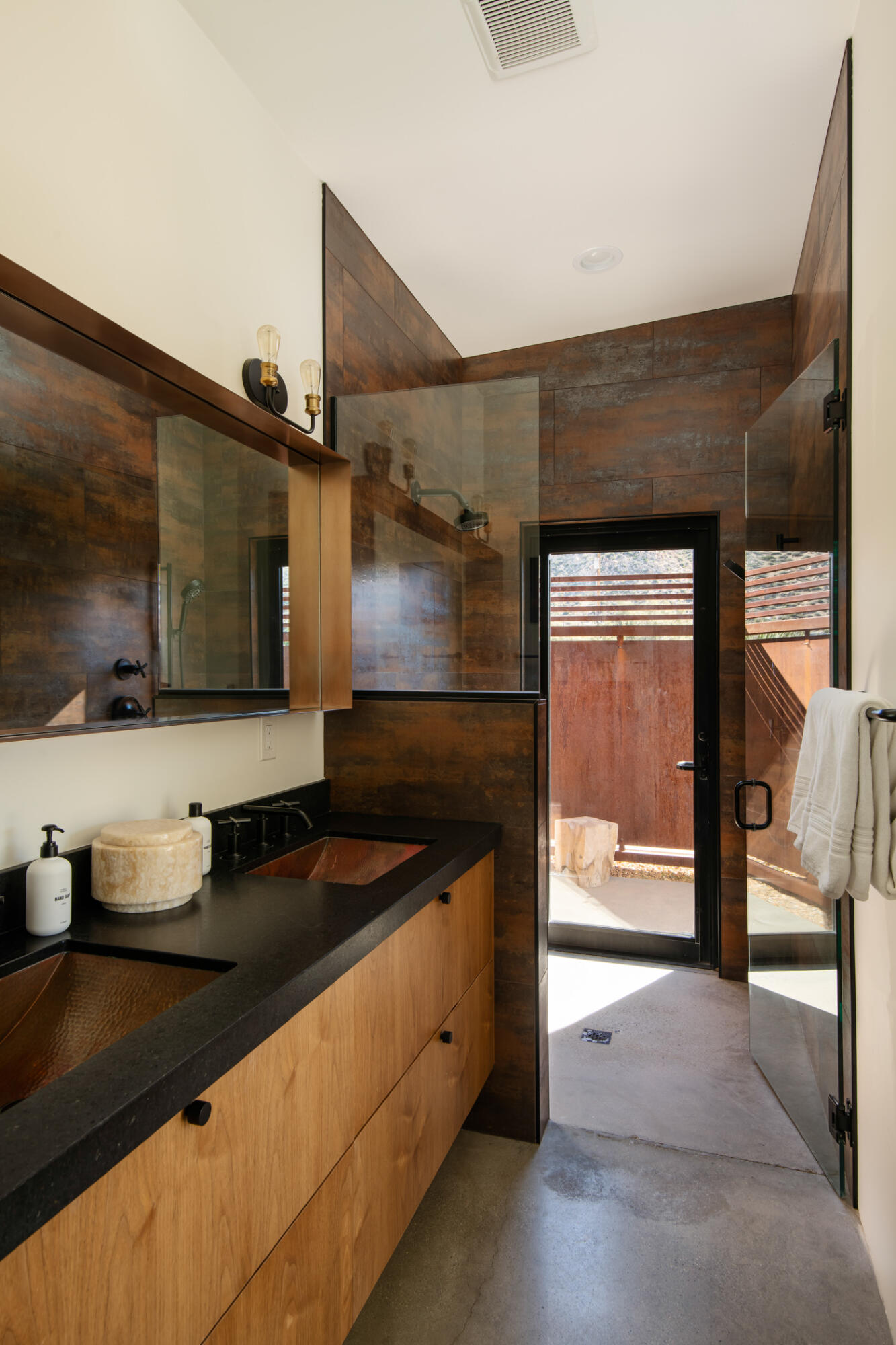 5494 Bronco Road Pioneertown, CA 92268 - Photo 21 of 38 a kitchen with stainless steel appliances granite countertop a sink and a stove