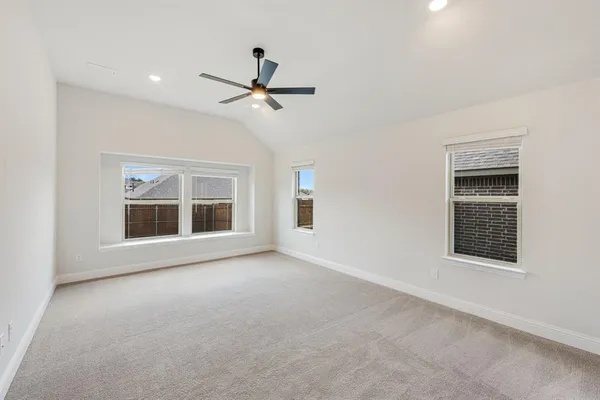 a view of empty room with windows