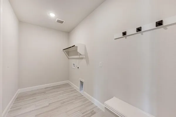 a view of small space with wooden floor