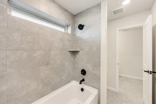 a bathroom with a bathtub