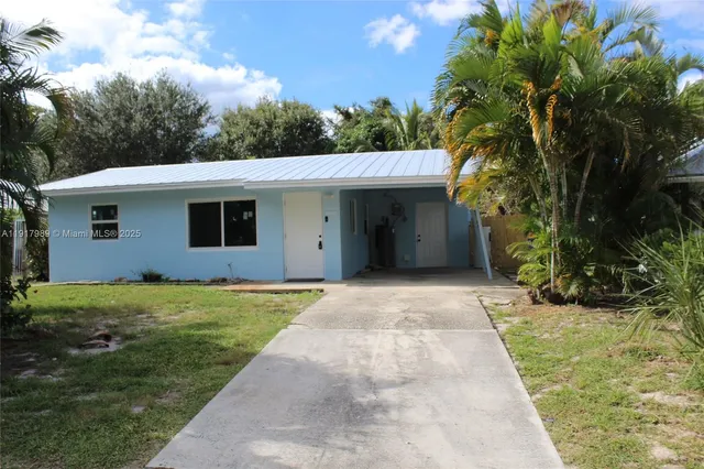 $335,000 | 5050 Southeast Ebbtide Avenue, Stuart, FL 34997