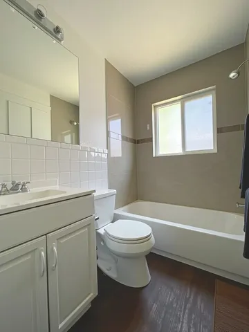 a bathroom with a sink a toilet and a bathtub