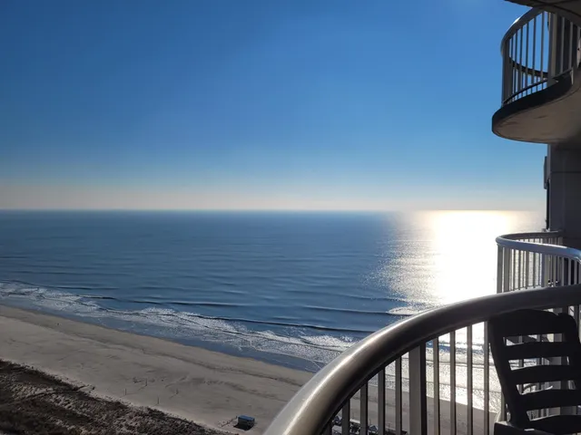 a view of a balcony with an outdoor space