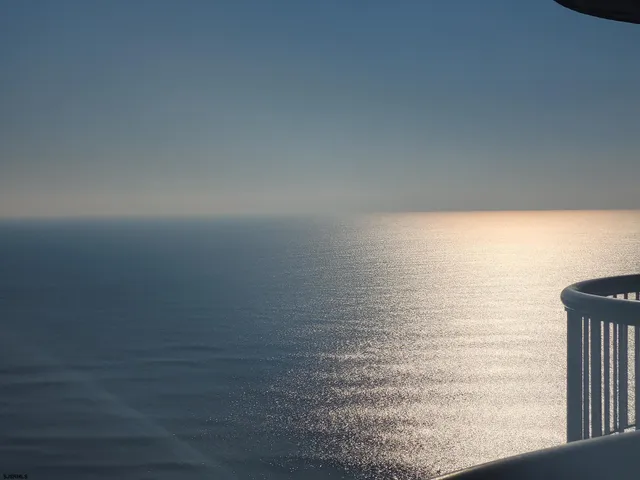 a bedroom with a bed and dresser