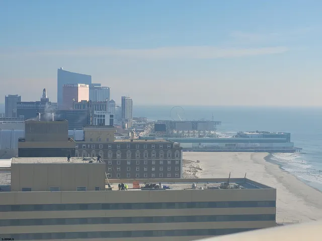 a bathroom with a toilet and a washing machine